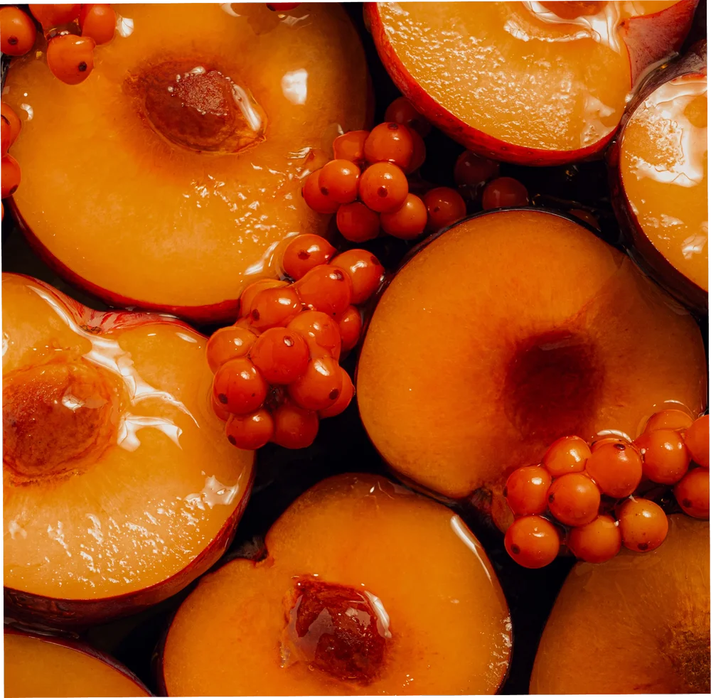 Aprikosen und Sanddornbeeren als Bildmotiv zur Baume Bonne Mine Pflege