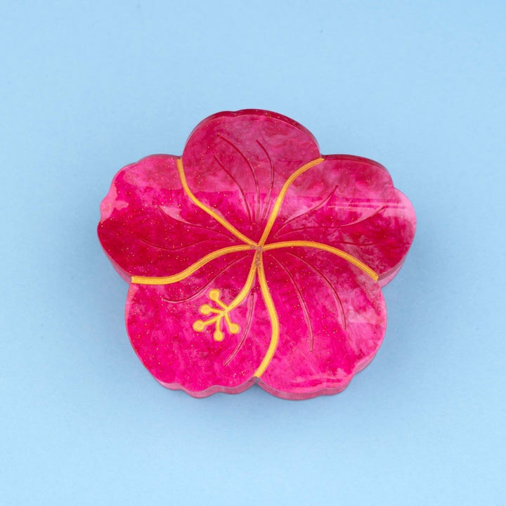Coucou Suzette Hibiscus Hair Claw - Produktbild türkiser Hintergrund