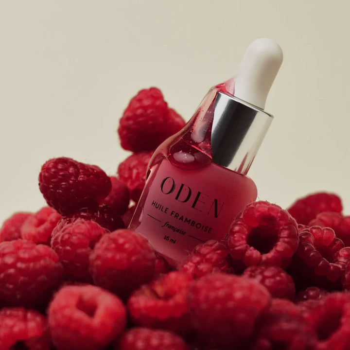 French Raspberry Oil von Oden - Produktfoto mit Himbeeren