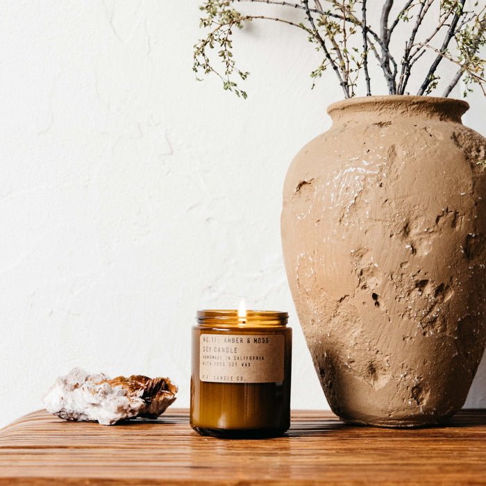 P.F. Candle Co. No. 11 Amber & Moss 204 g - burning candle